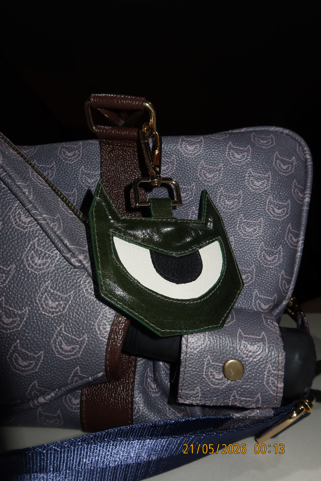 PULGA EYE CHARM — LEATHER