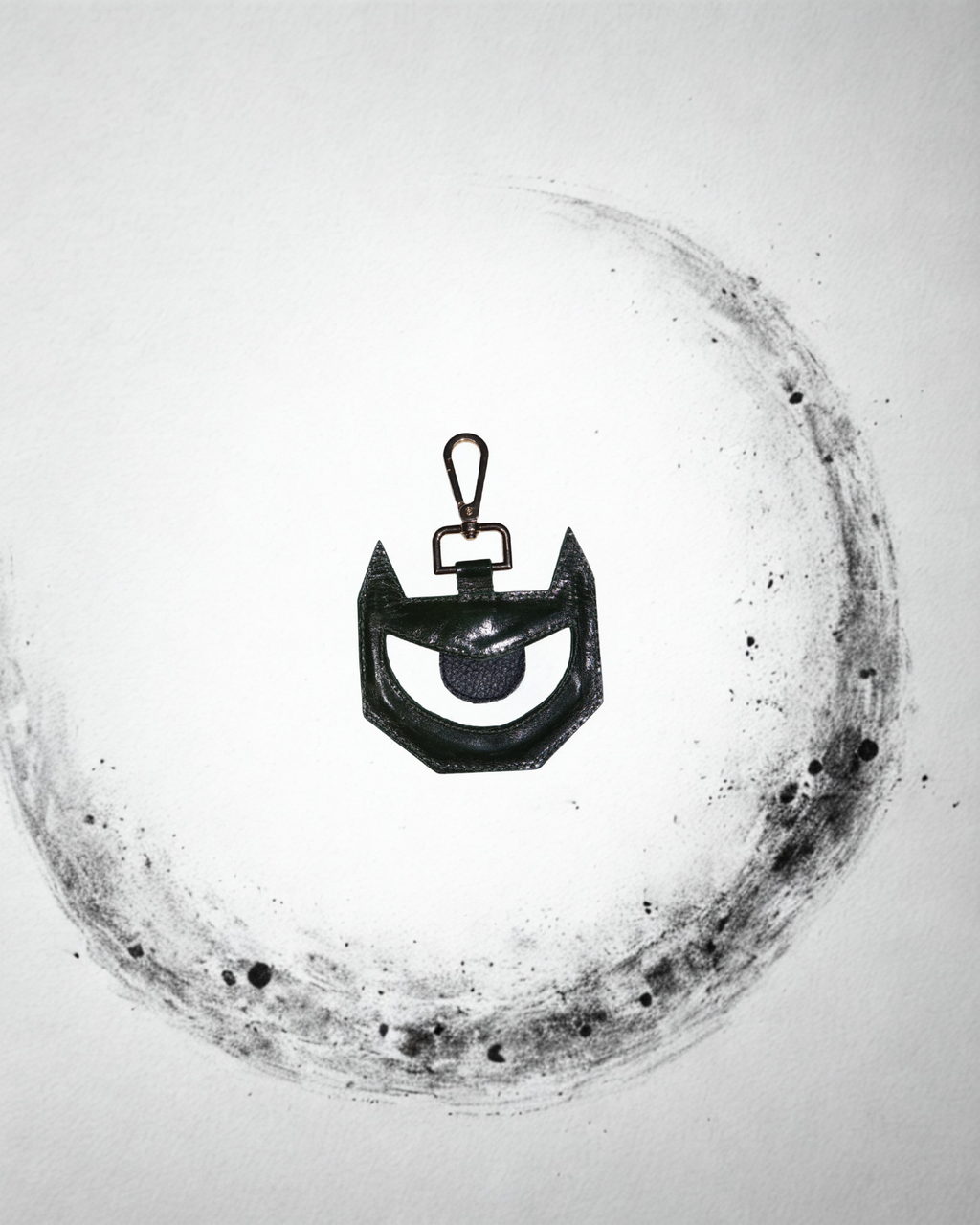 PULGA EYE CHARM — LEATHER