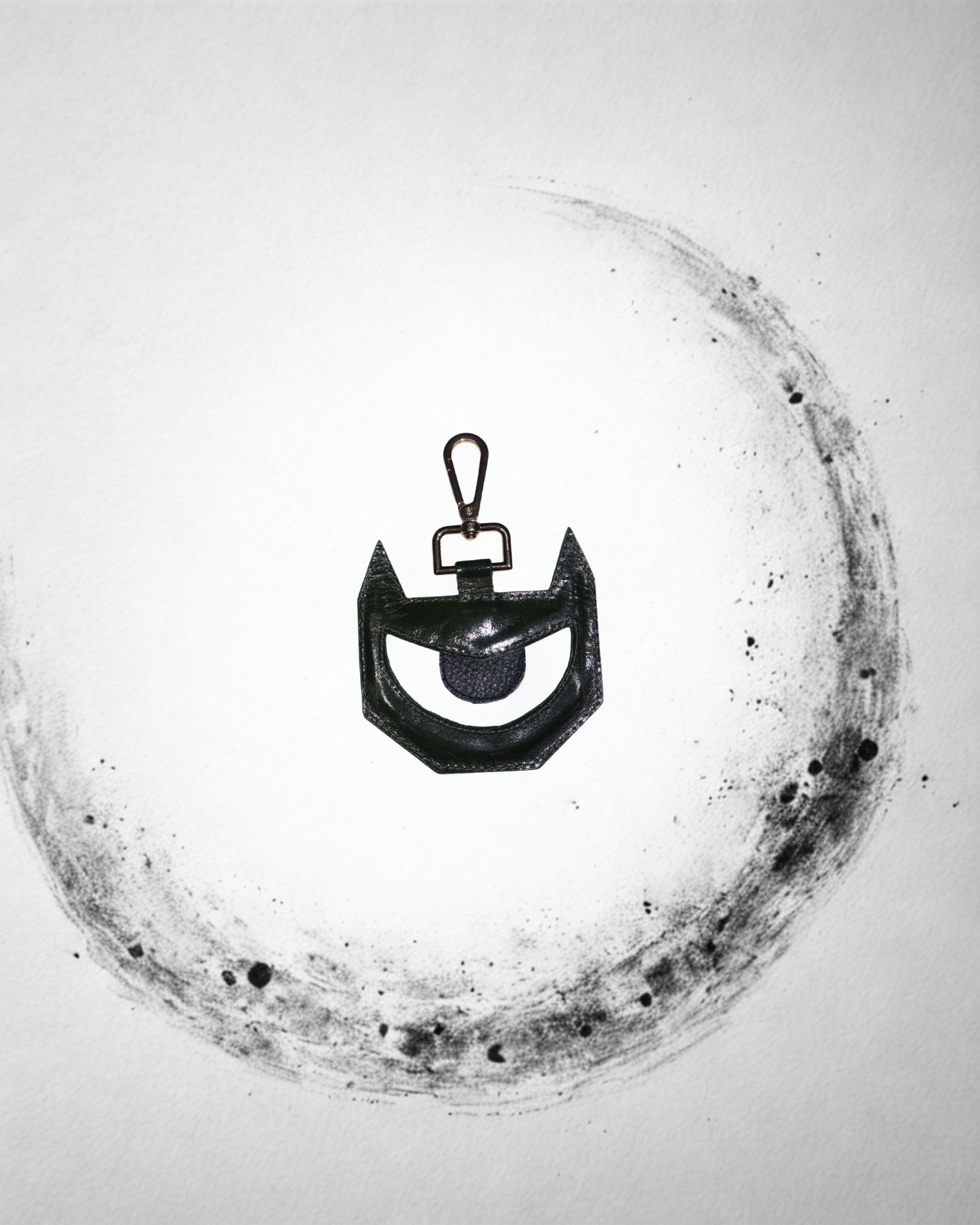 PULGA EYE CHARM — LEATHER